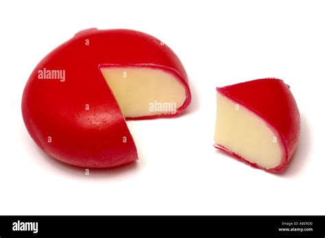 Babybel Cheese In Red Wax Cover With Wedge Sliced Off Stock Photo Alamy