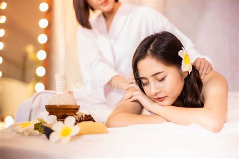 Asian Beautiful Young And Healthy Woman In Spa Salon Massage Treatment Spa Room Traditional