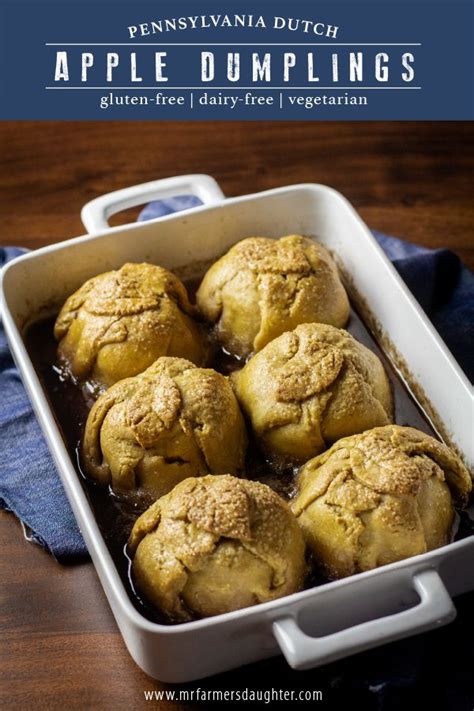 Apple Dumplings In A White Baking Dish On A Wooden Table With Text