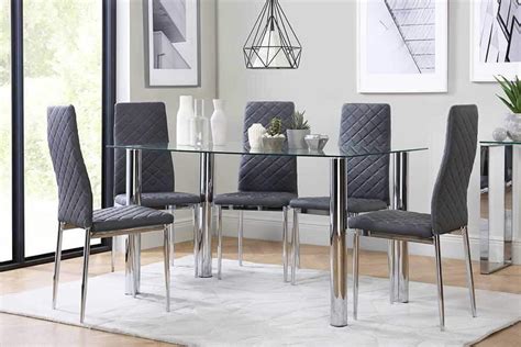 The tempered glass table top resting on a sculptured chrome base gives a modern feel. Chrome Dining Sets | Dining Room Furniture | Furniture And Choice