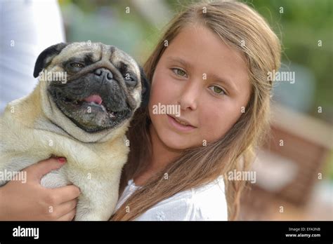 Young Girl Wearing A Dog Stock Photo Alamy