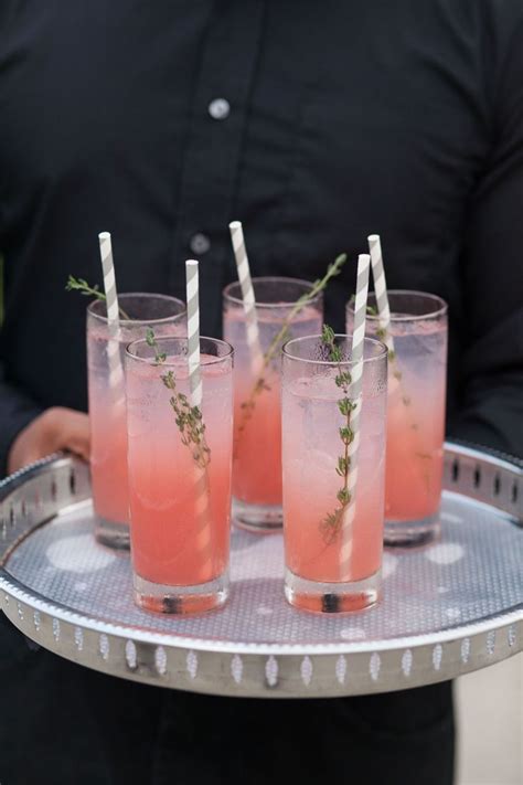 Pink Signature Cocktails With Thyme Garnish Signature Cocktail