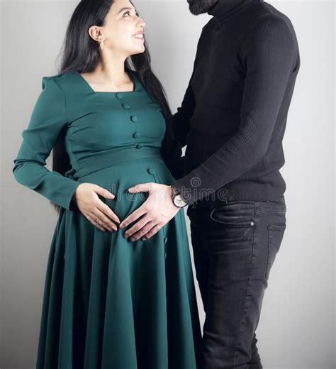 Pregnant Woman And Her Handsome Husband Hugging Belly Stock Image Image Of Happy Woman 260381787