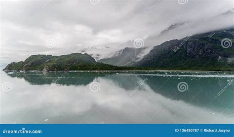 Mountains And Ocean With Cloudy Sky At Glacier Bay Alaska Stock Image