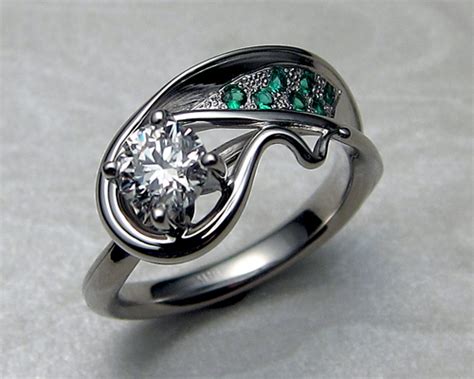 Nothing's distracting from the beauty. Asymmetrical, free-form, engagement ring, with diamond and ...