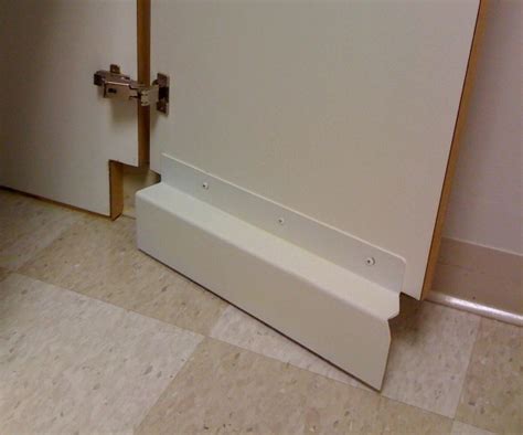 Accessible ada sink base kitchen cabinet in medium oak. toe kick
