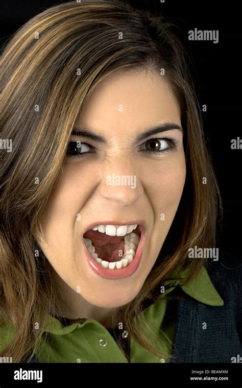 Portrait Of A Young Attractive Woman Yelling Stock Photo Alamy