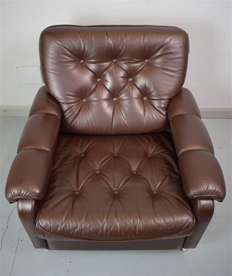 3 seater brown faux leather sofa and matching armchair. Vintage Danish dark brown leather lounge armchair - 1970s ...