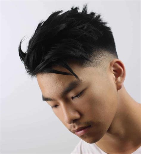 Messy spikes over a low fade #menshair #menshairstyles #
