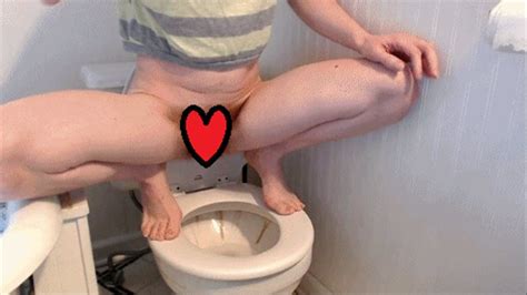 Hot Redhead Squirting Milf Squatting On The Toilet
