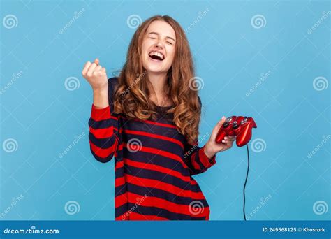 Woman Yelling Happily Celebrating Completing Level In Video Games