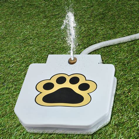 They're going to enjoy the feeling of fresh and cool water down their necks. TrioGato's Outdoor Dog Pet Water Sprinkler Easy Activated ...