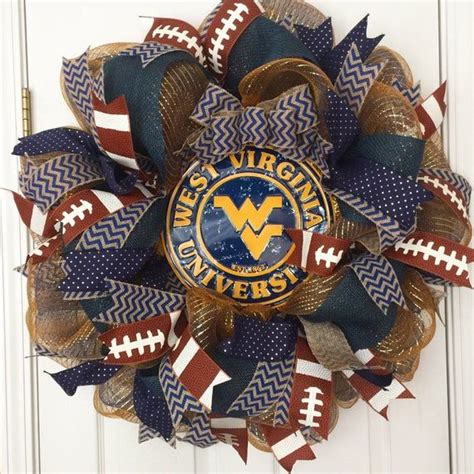 A Wreath With The Word West Virginia On It And An American Football