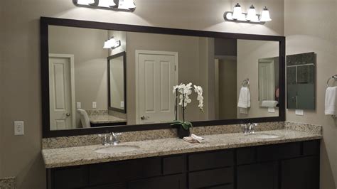 You might be wondering how a large bathroom mirror can give your bathroom a facelift. Before and After: Customer Bathroom in Las Vegas | Frame ...