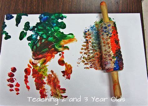 Preschool Painting With Rolling Pins Painting Activities Preschool