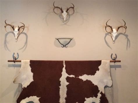 A Tispy Oklahoma Gardener How To Hang A Cowhide Rug