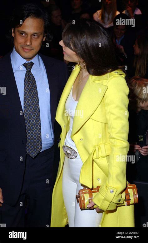 Elizabeth Hurley And Boyfriend Arun Nayar At The Versace Fashion Show