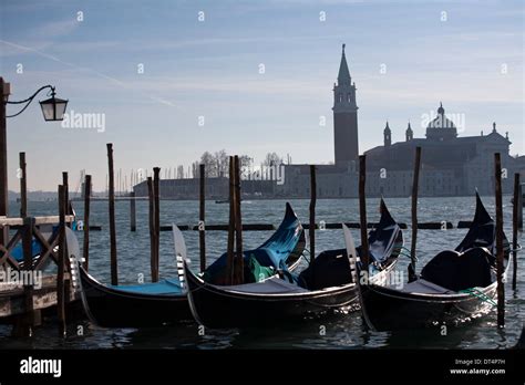 Closeup Of Gondolas On Venetian Lagoon Water And San Giorgio Maggiore