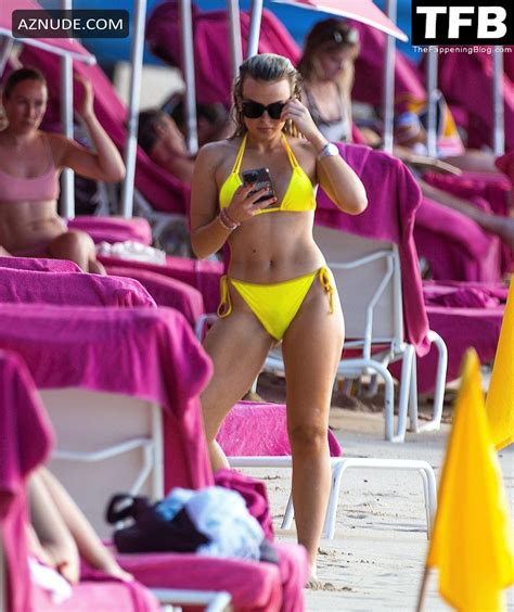 tallia storm sexy shows off her incredible physique in a hot yellow bikini at sandy lane hotels