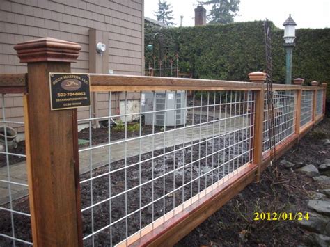 The hog wire fence means that some pieces of wire are arranged together in crossing and the woods are only used as the frame. "Hog panel" fence | Deck Masters, llc - Portland, OR