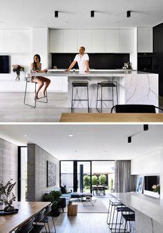 20 gray kitchen cabinets we're loving. black and white contemporary kitchen - love the black wall ...
