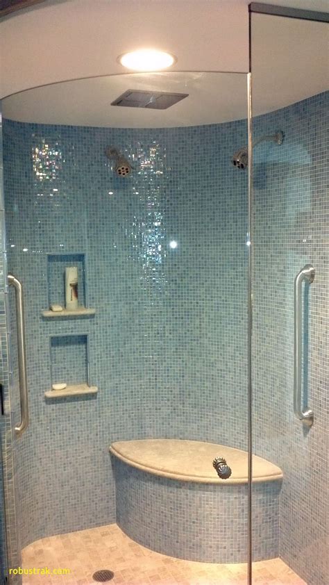 Iridescent Blue Glass Tile Shimmers On Curved Shower Walls Glass Tile