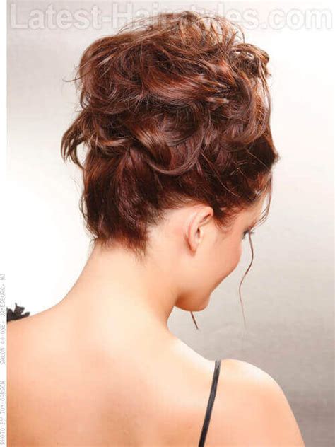 This british beauty's braids are intricate yet subtle—an ideal style when you've skipped the shower and have a little extra grease in your hair. 36 Curly Updos for Curly Hair (See These Cute Ideas for 2018)
