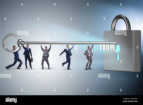The concept of teamwork with businessmen unlocking lock Stock Photo - Alamy