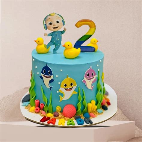 Baby Shark And Cocomelon Theme Cake Chocolaparis