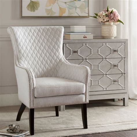 Maybe you would like to learn more about one of these? Ivory Lanea Quilted Accent Chair with Silver Studs ...