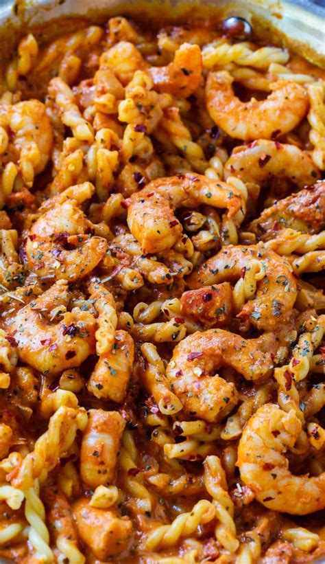 Now add crushed tomatoes, paste, salt, pepper, and a heaping tablespoon of cajun seasoning (if wanting it milder just add a teaspoon or two and use mild. Spicy Shrimp and Tomato Cream Pasta - Spicy Southern Kitchen