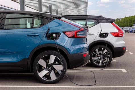 Pure Electric Volvo C40 And Xc40 Recharge At A Charging Station Volvo