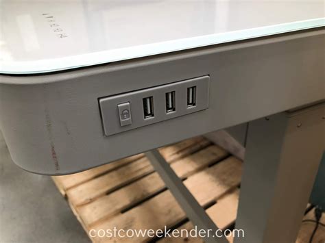 The desk supports laptops providing a kind of leverage. Tresanti Adjustable Height Desk | Costco Weekender
