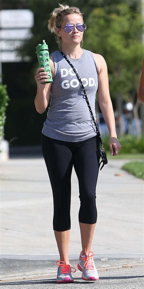reese witherspoon hits the gym in do good t shirt and cropped leggings