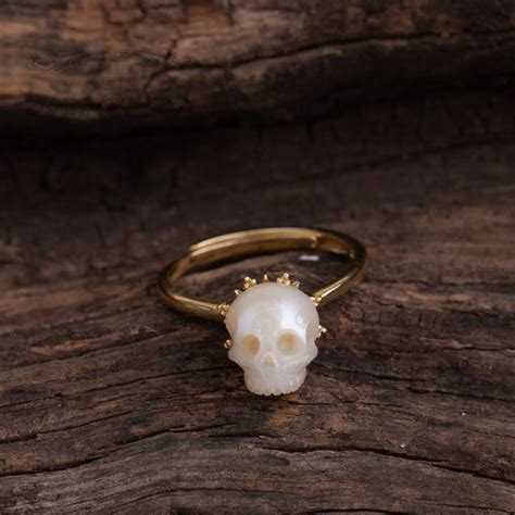 The design features a 1 carat round black diamond. Skull carved pearl ring ivory freshwater pearl handmade 925 | Etsy | Skull carving, Pearl ring ...