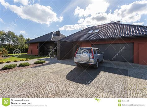 Car Parked In Front Of A House Stock Image Image Of Building