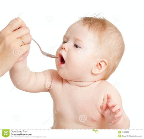 Delivery frequency and menu options Little Baby Feeding With A Spoon Royalty Free Stock Photos ...