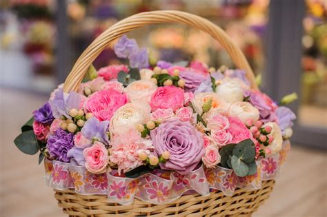 Beautiful Bouquet Of Pink Purple Flowers In Basket Stock Photo