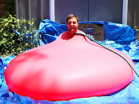 Watch A Guy Put Himself Inside A Giant Water Balloon Spoiler Alert It Explodes People