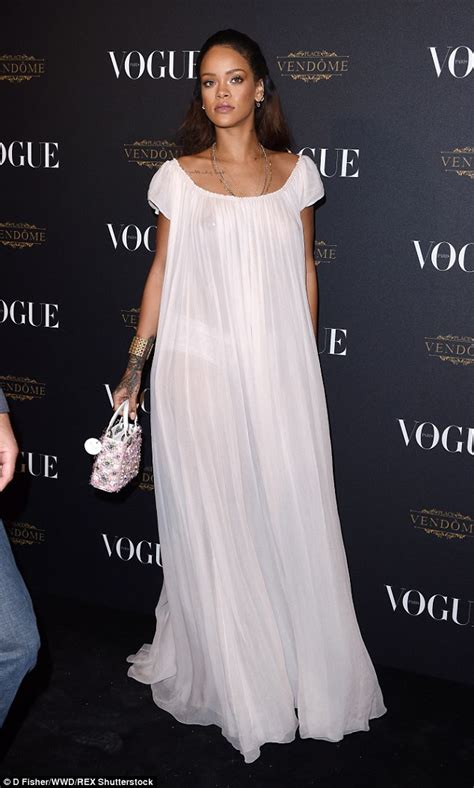 Rihanna Goes Braless In Sheer Dress At Vogue S Paris Fashion Week Party Daily Mail Online