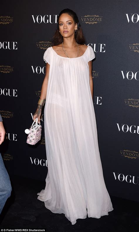 Rihanna Goes Braless In Sheer Dress At Vogues Paris Fashion Week Party