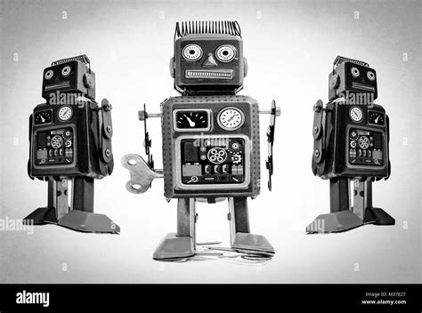Three Black Robot Toys On White Stock Photo Alamy