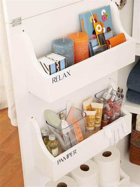 A basket of extra rolls of toilet paper on the back of the toilet to encourage your family to change the role when they run out. 11 Fantastic Small Bathroom Organizing Ideas- A Cultivated ...