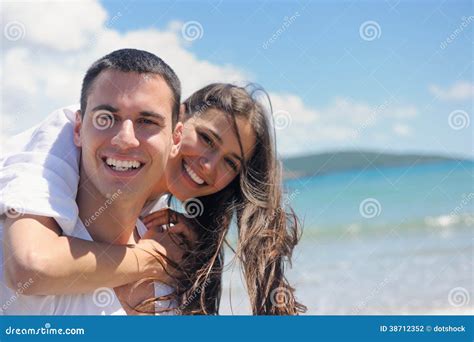 Happy Couple Have Fun On The Beach Stock Photo Image Of Outdoor