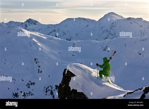Freestyle Skier On The Way To A Downhill Ski Run Hochfuegen Zillertal