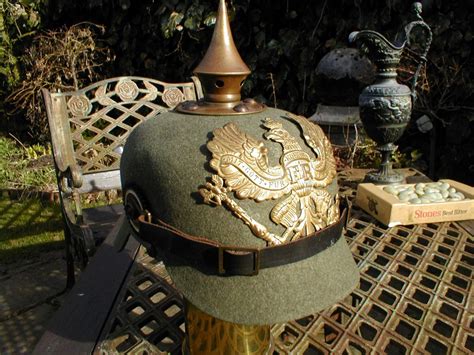 Looki g for a badge for my artillery pickelhaube does anyone know of any for sale at a reasonable price, thanks in advance mike. Another Ersatz Pickelhaube...Prussian.