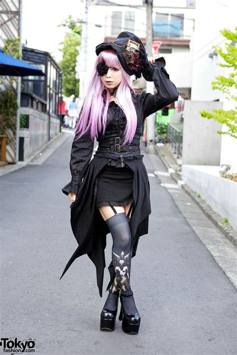 striking harajuku gothic style w pink hair eye patch corset and garters