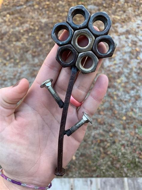 We did not find results for: Metal flower made of welded nuts | Metal flowers, Metal ...