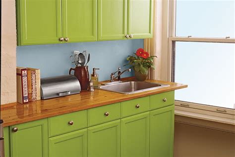 Start at the top and paint it from side to side. 10 Ways to Spruce Up Tired Kitchen Cabinets - This Old House