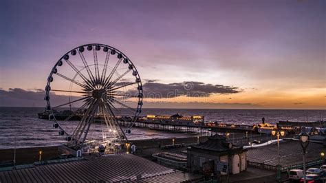 The Victorian Brighton Pier And The Brighton Wheel After Sunset